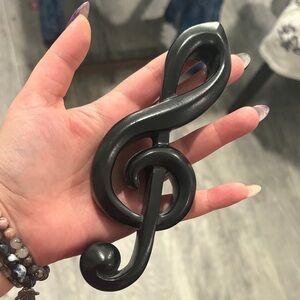 Hanging treble clef wall ornament